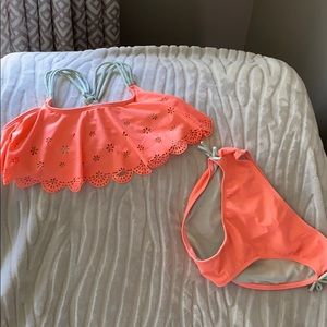 Girls size 10/12 coral colored 2 pc suit